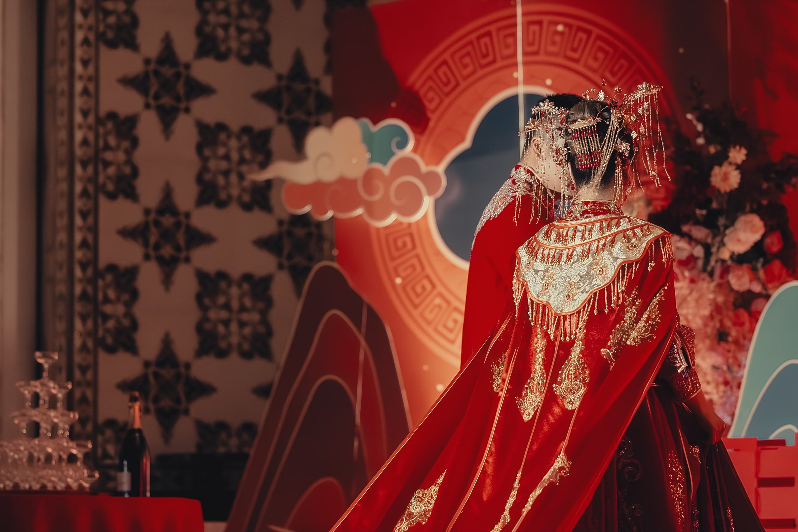 Embroidered gold-thread detail on a 龙凤褂 cape from behind — Orchid Photo, GTA Chinese wedding