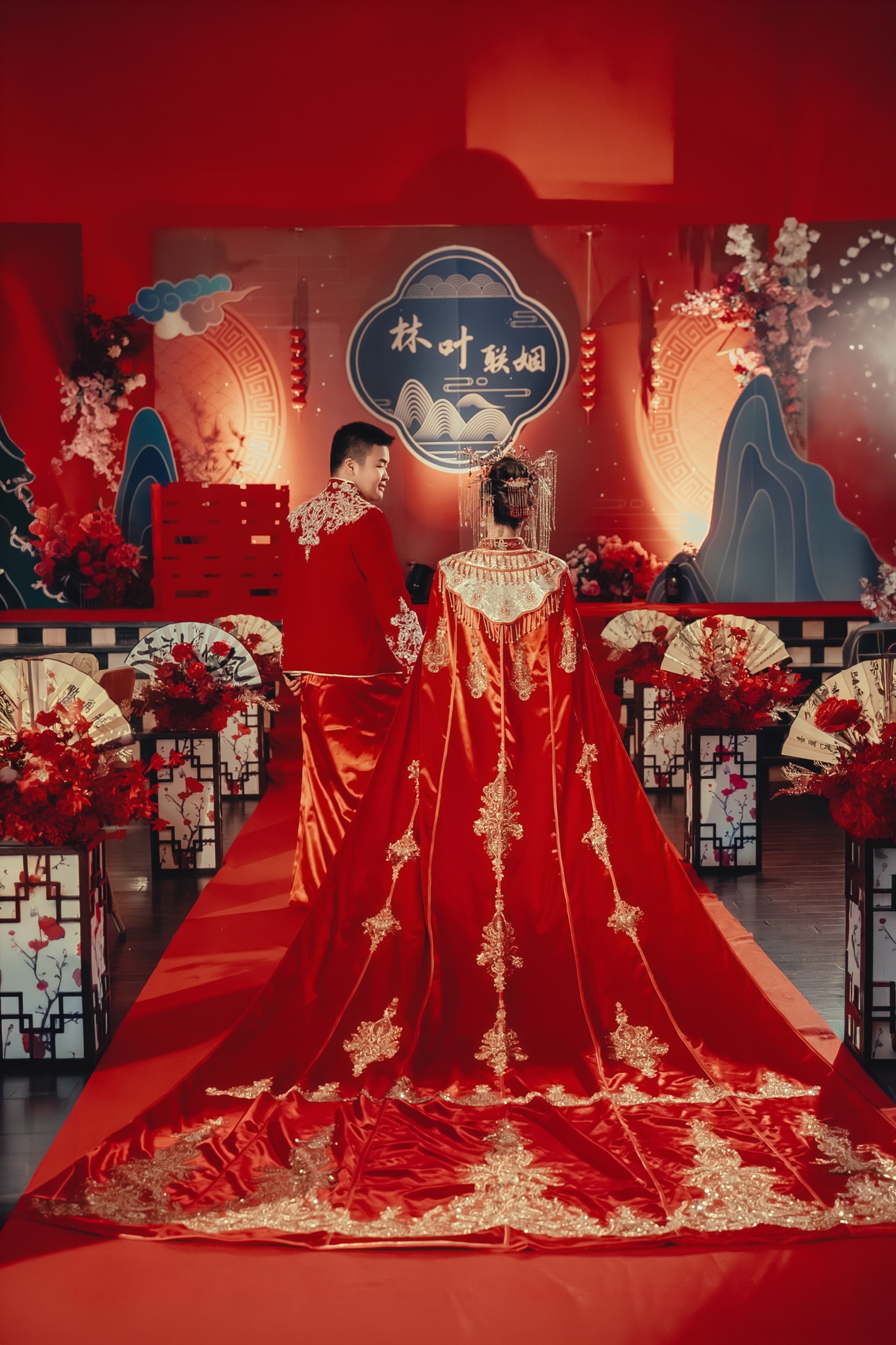 The bride's red gown and trailing train