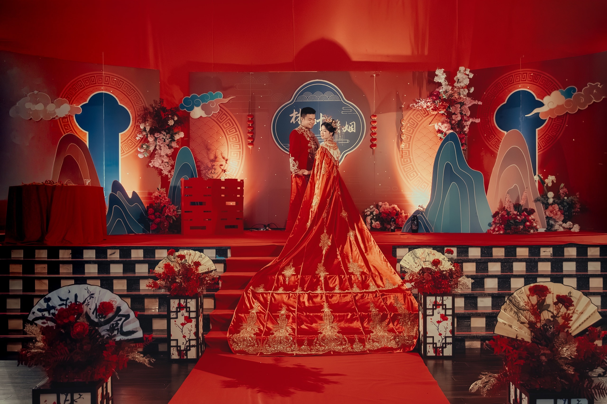 The couple in red embroidered robes