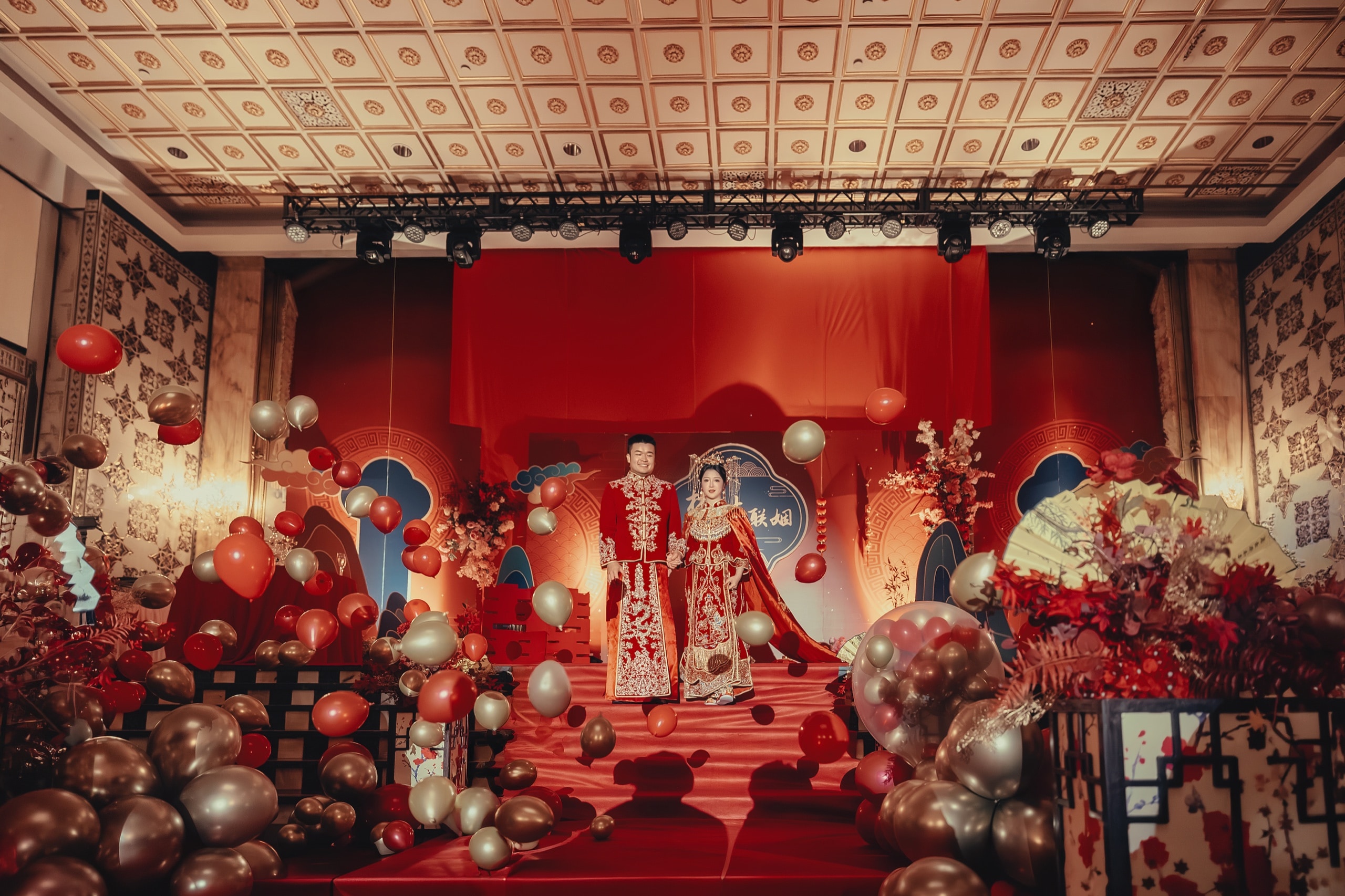 The couple amid balloons