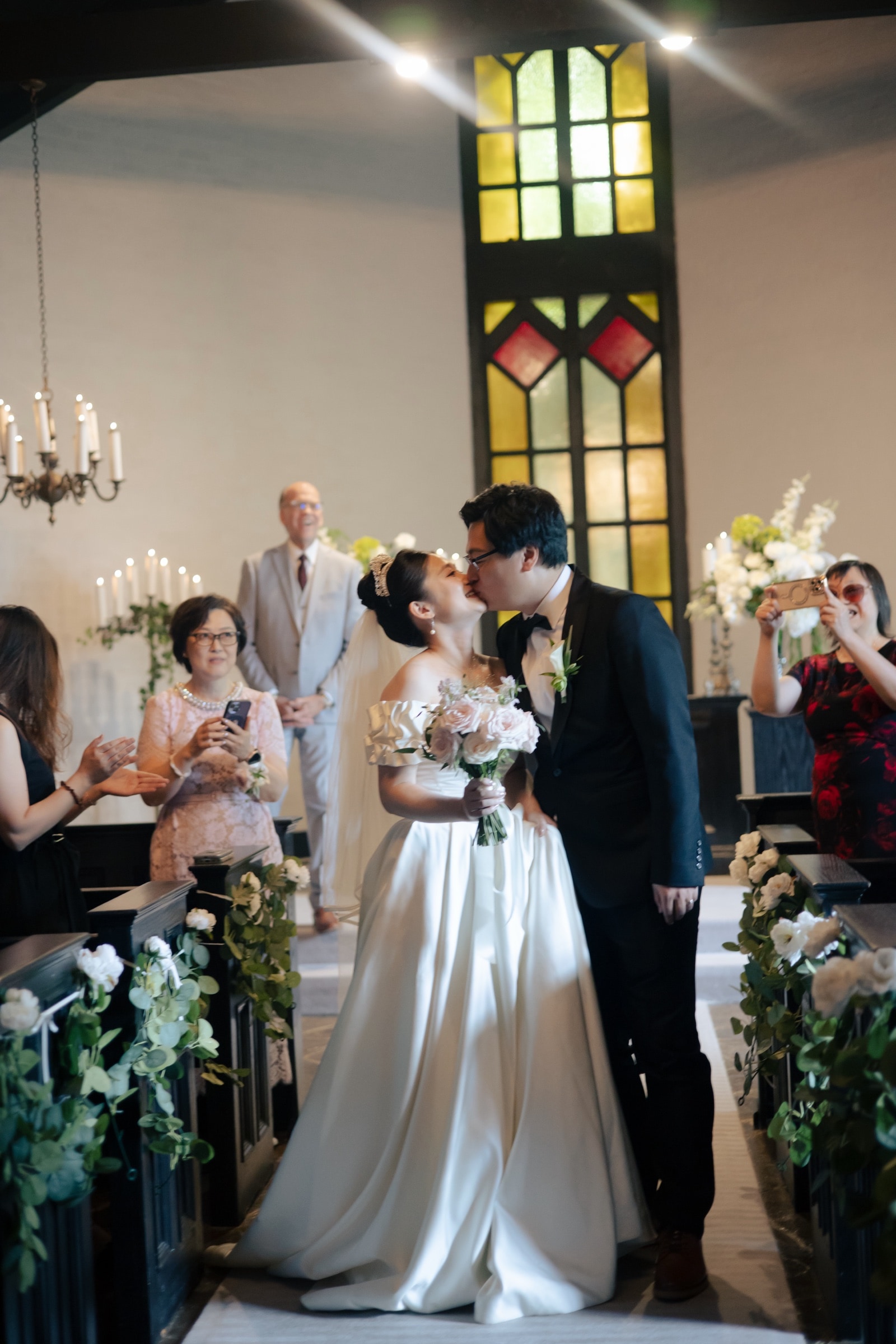 The first kiss at the close of the chapel ceremony