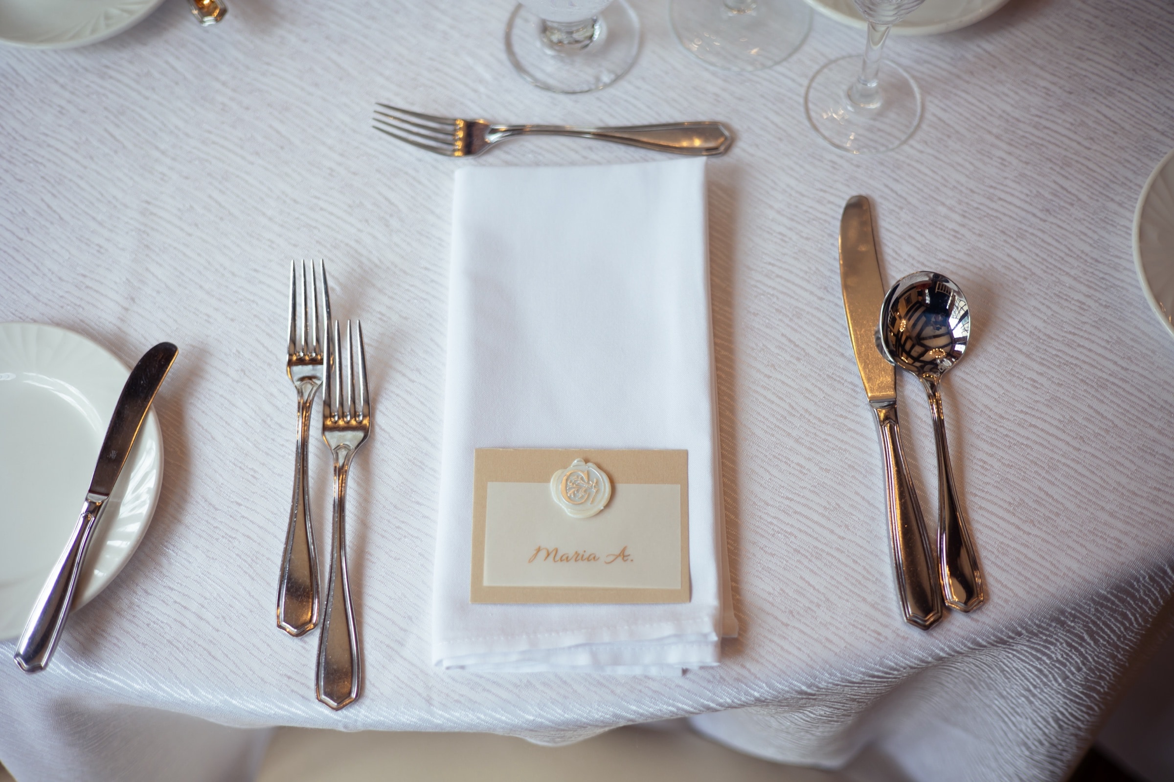 The wood-panelled reception hall set for the wedding dinner