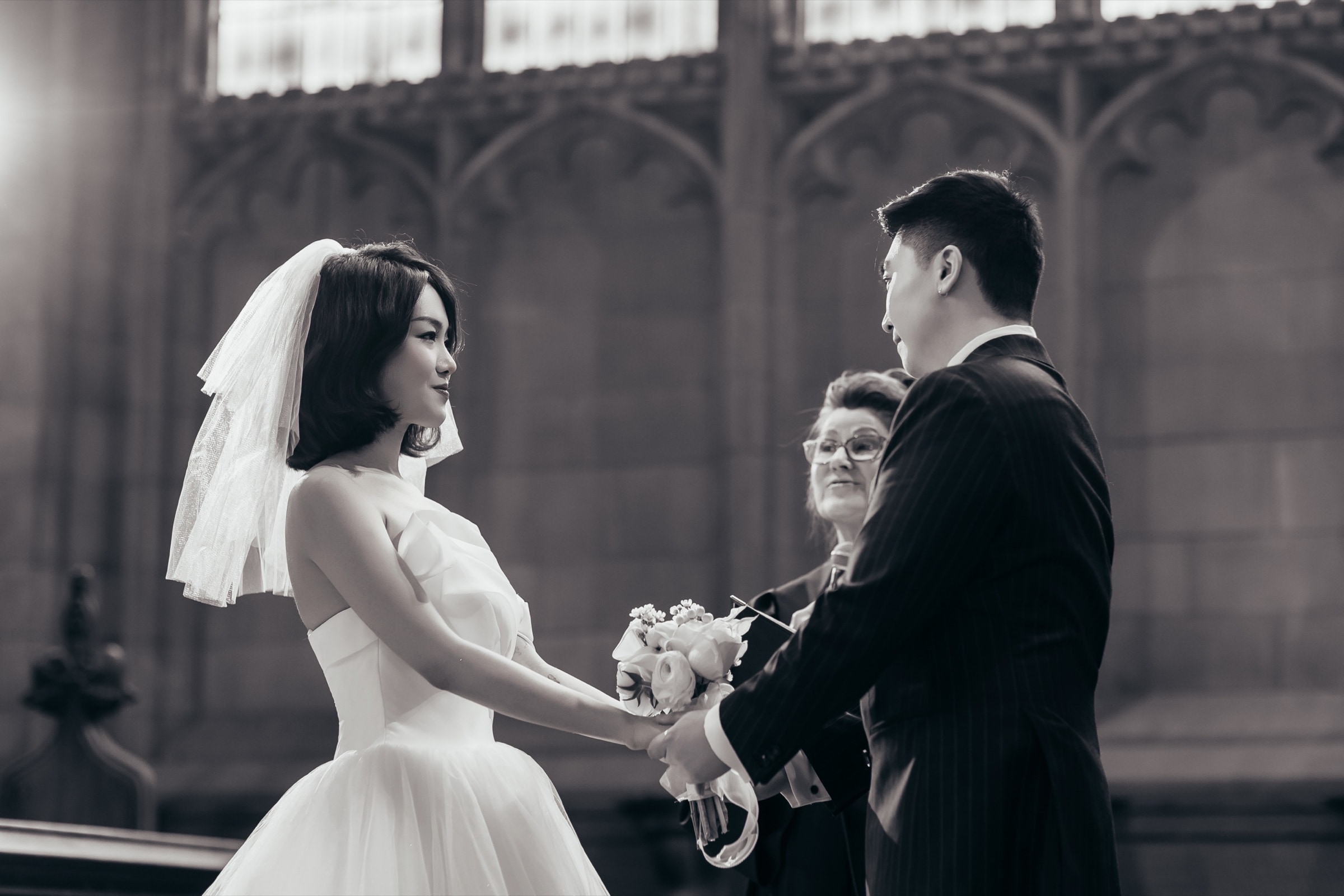 The bride, her veil catching the light