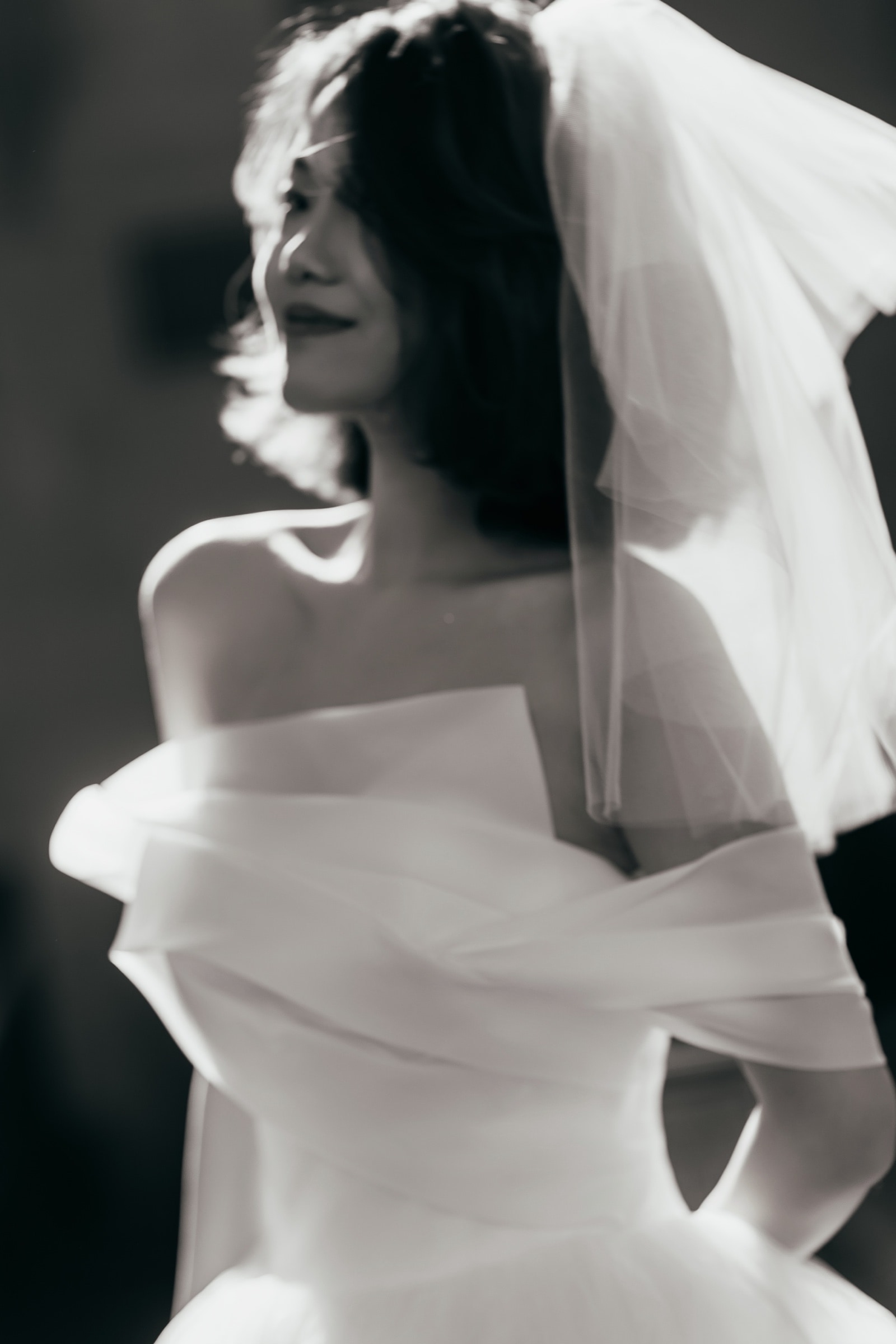 The bride's veil in backlit afternoon light