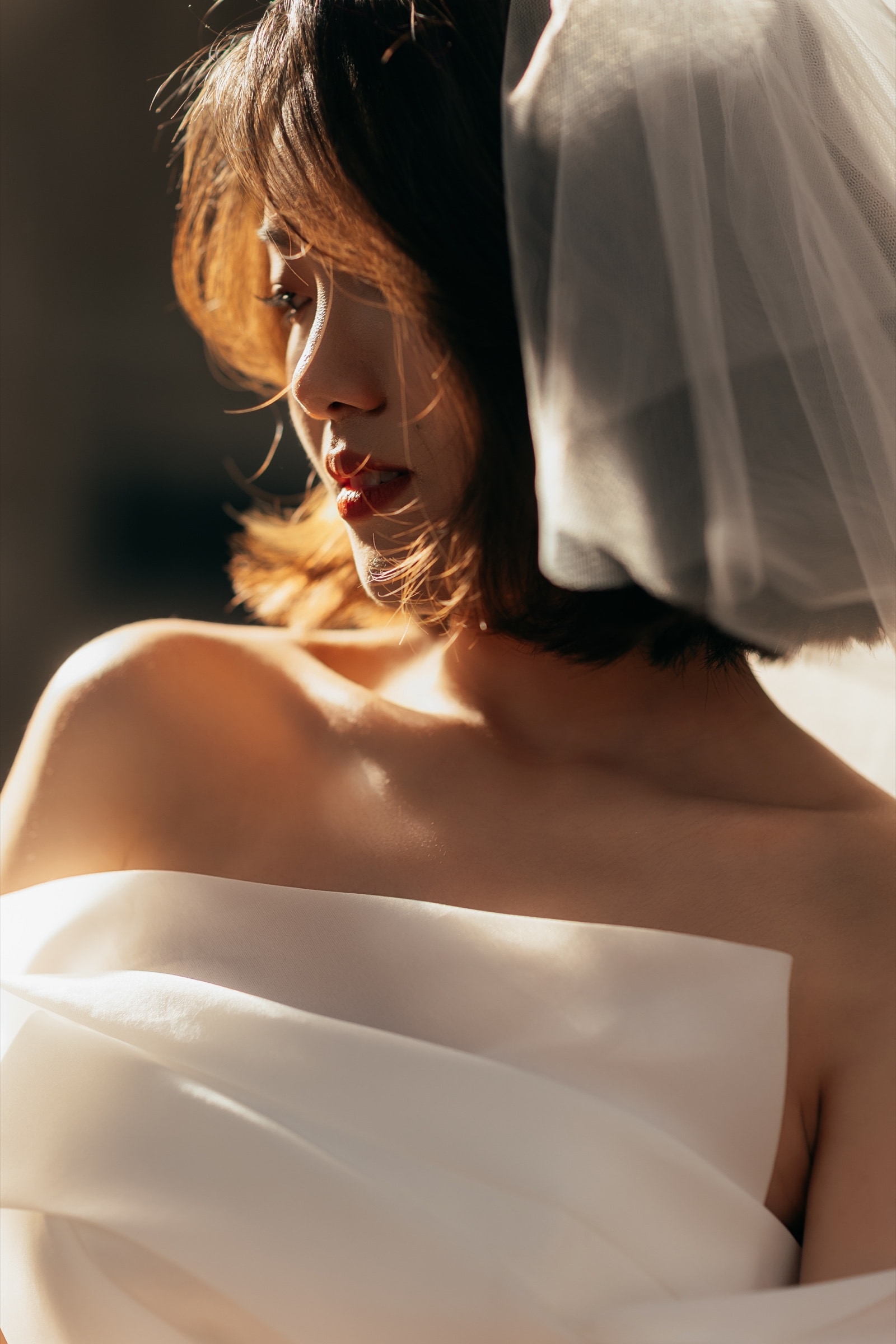 A black-and-white portrait of the bride