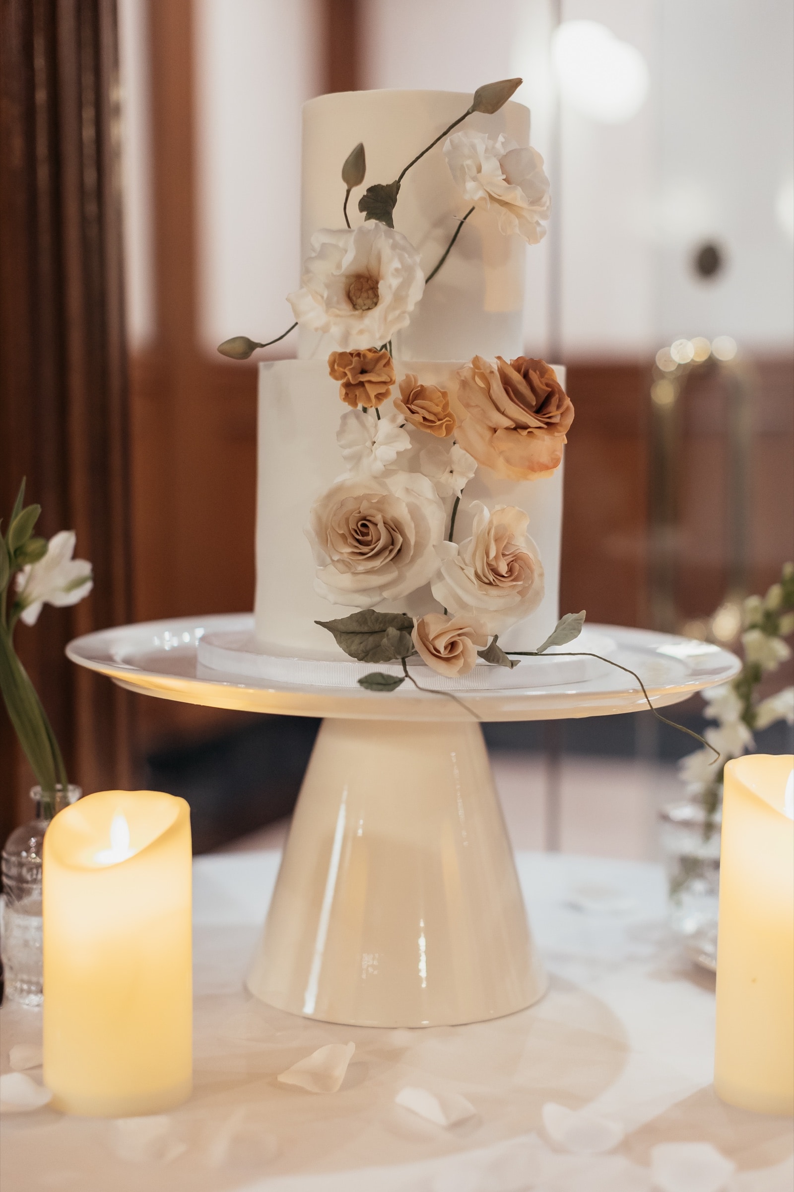 Candlelit reception florals on the long tables