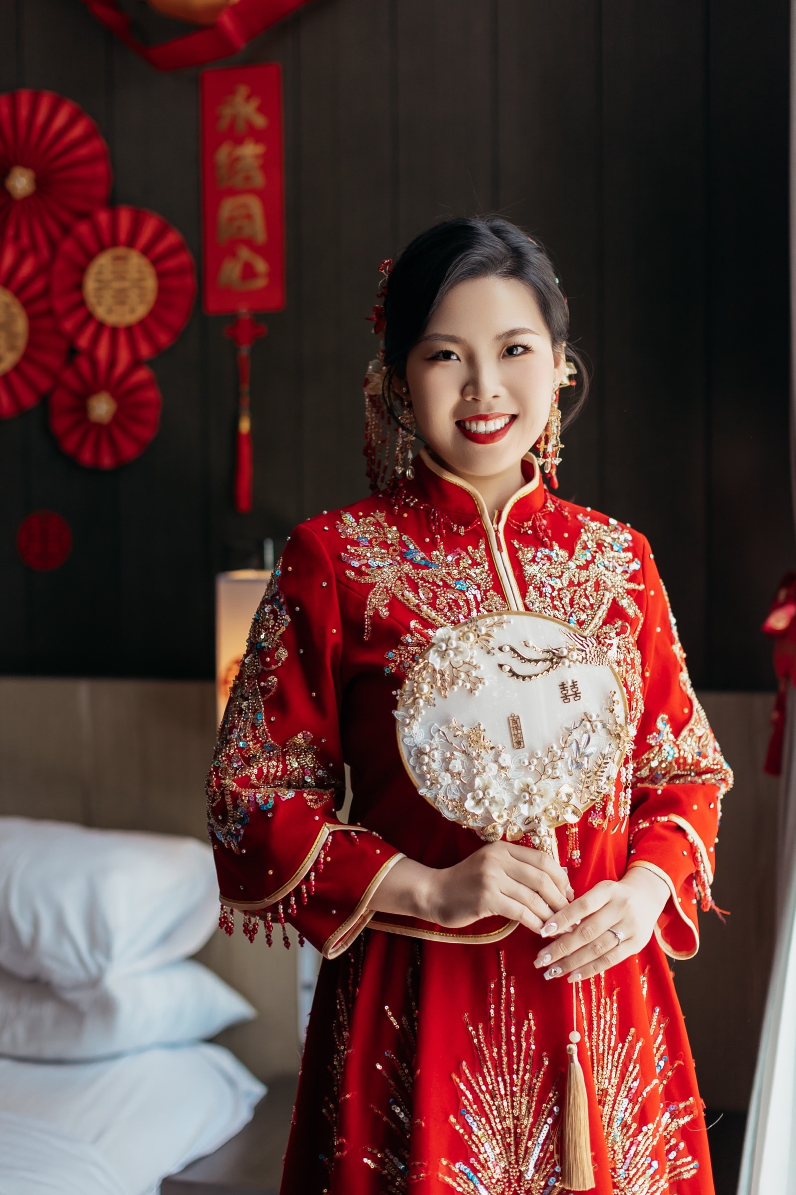 The bride in her red qipao