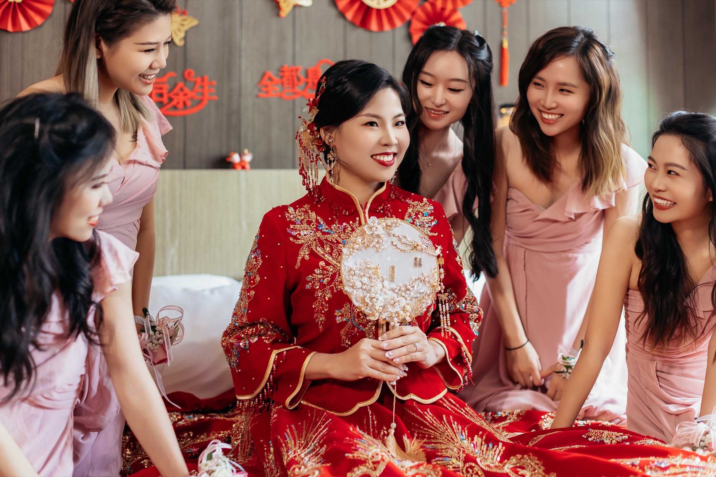 The bridal party in red
