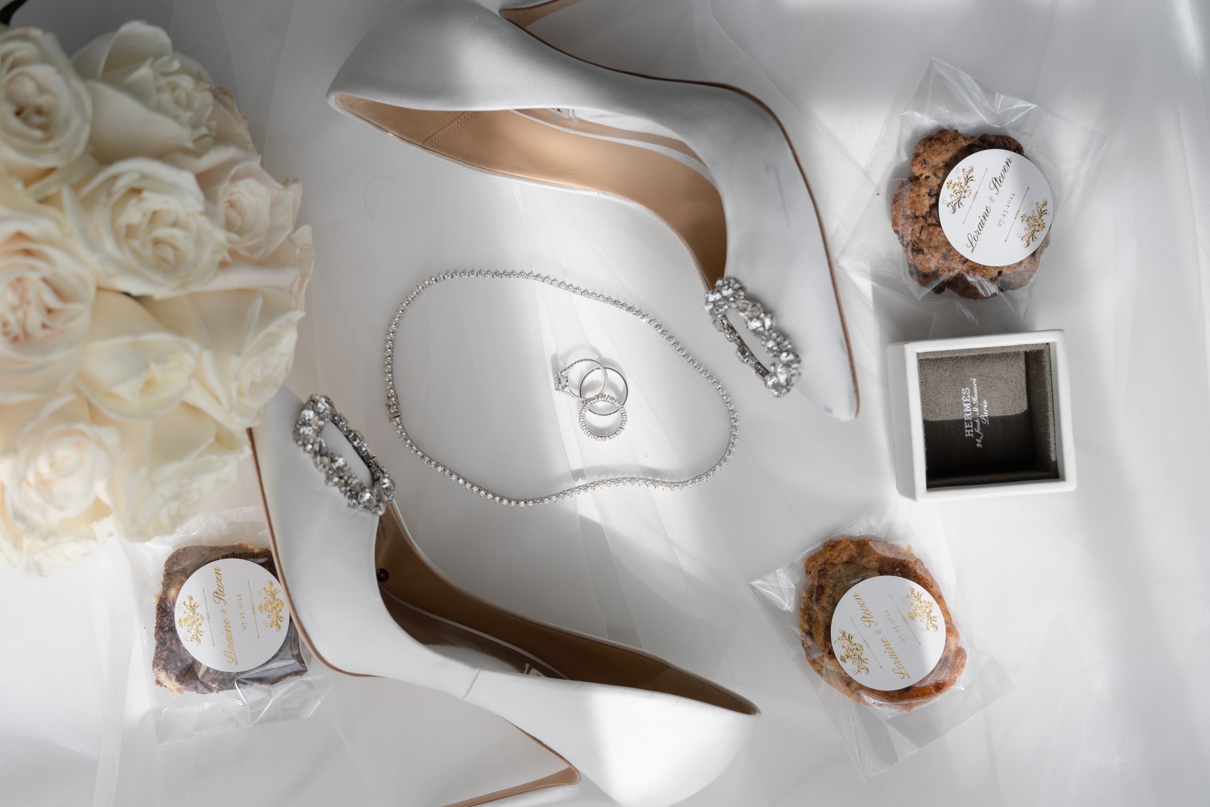 Flat-lay of the bridal shoes, rings and heirloom details