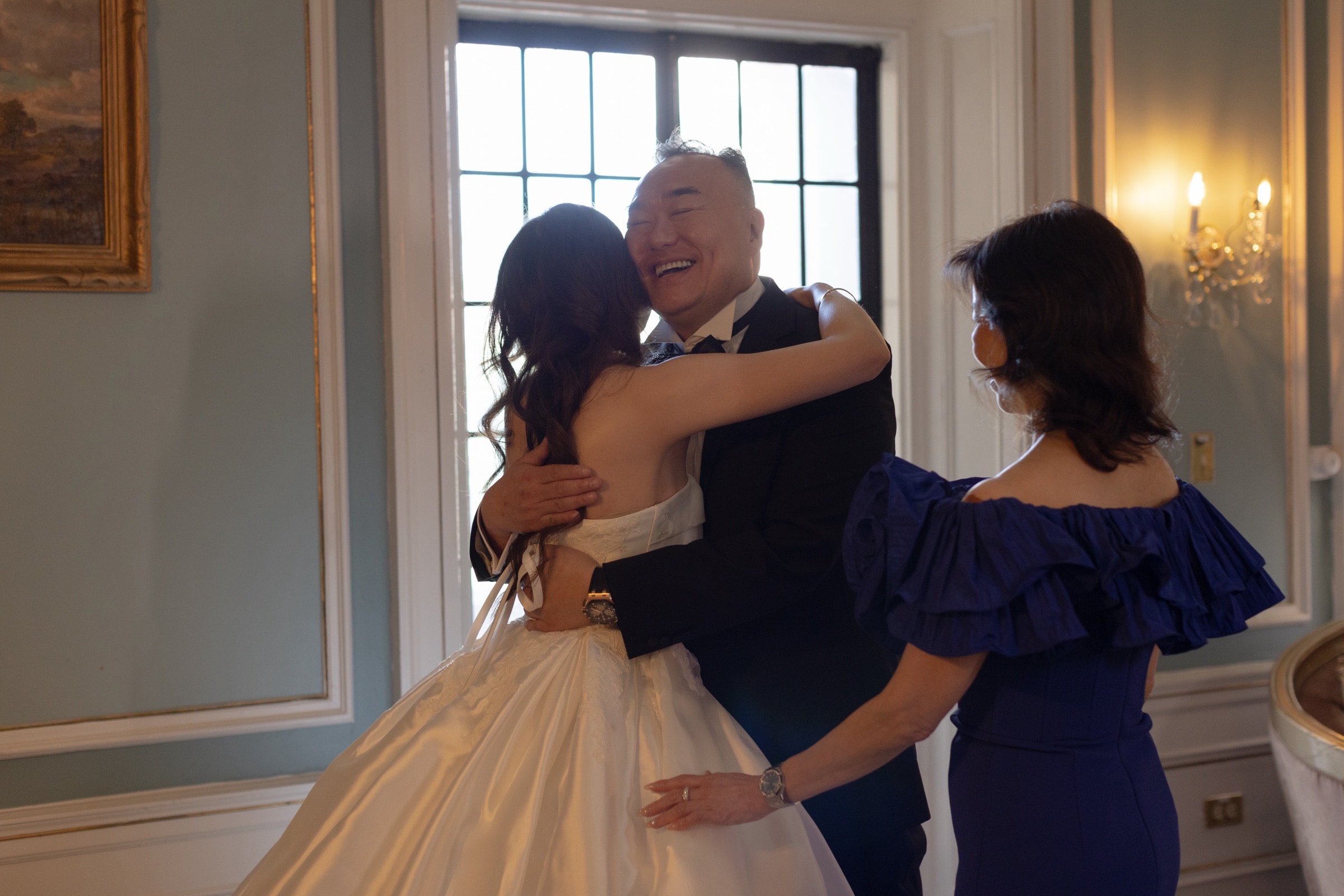 An emotional embrace before the ceremony