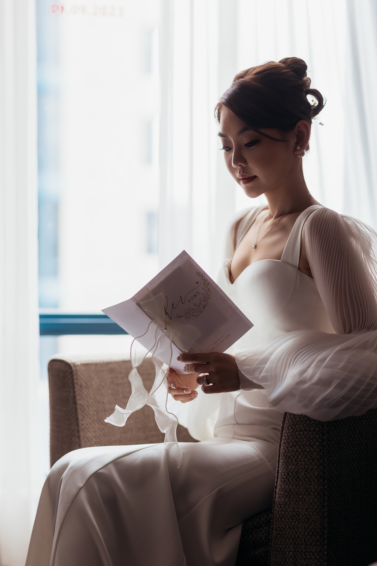 The bride reading her vows during getting ready