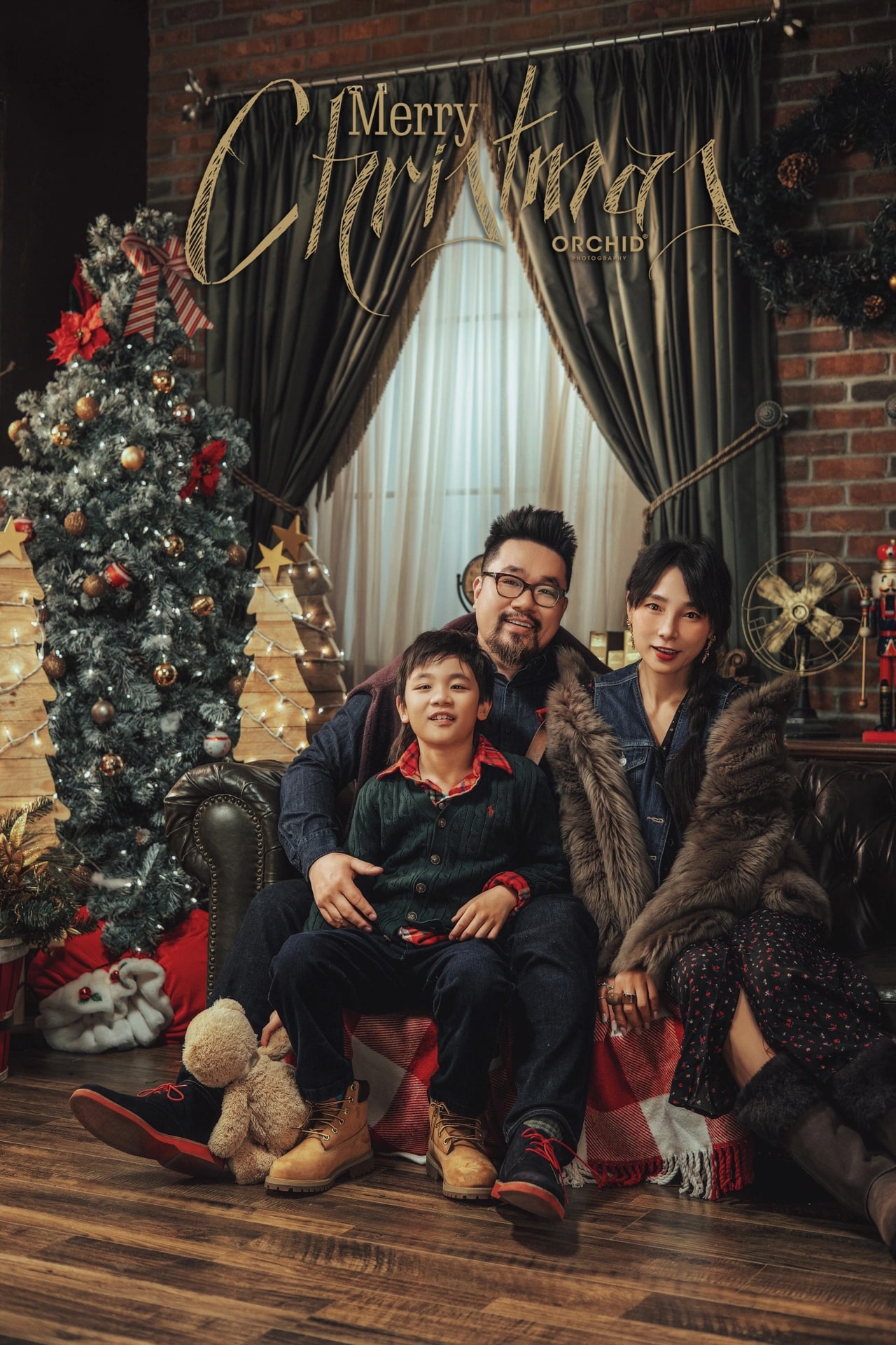 Christmas Wonder — a family in front of dark curtains