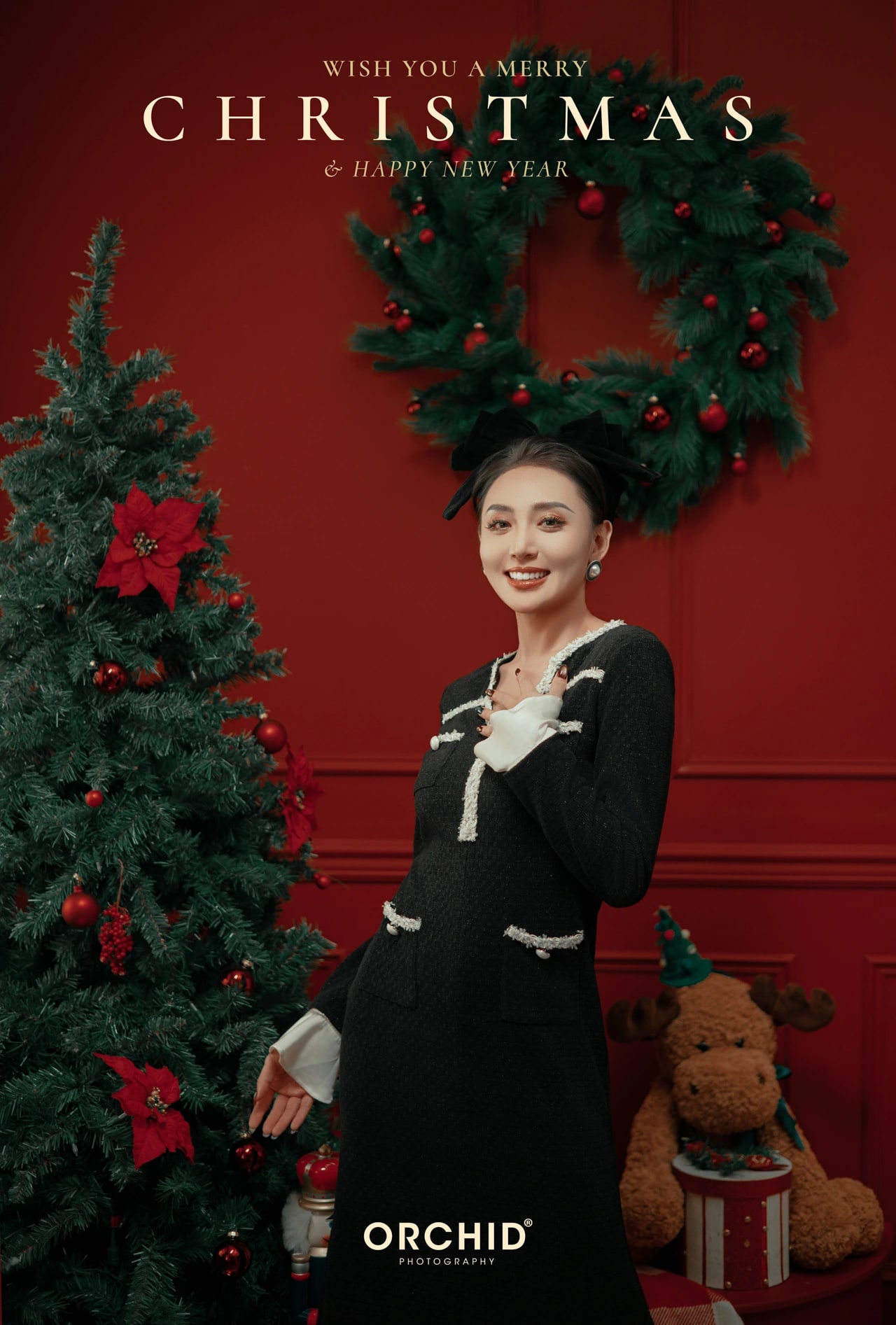 Christmas Wonder — a portrait by the red wall
