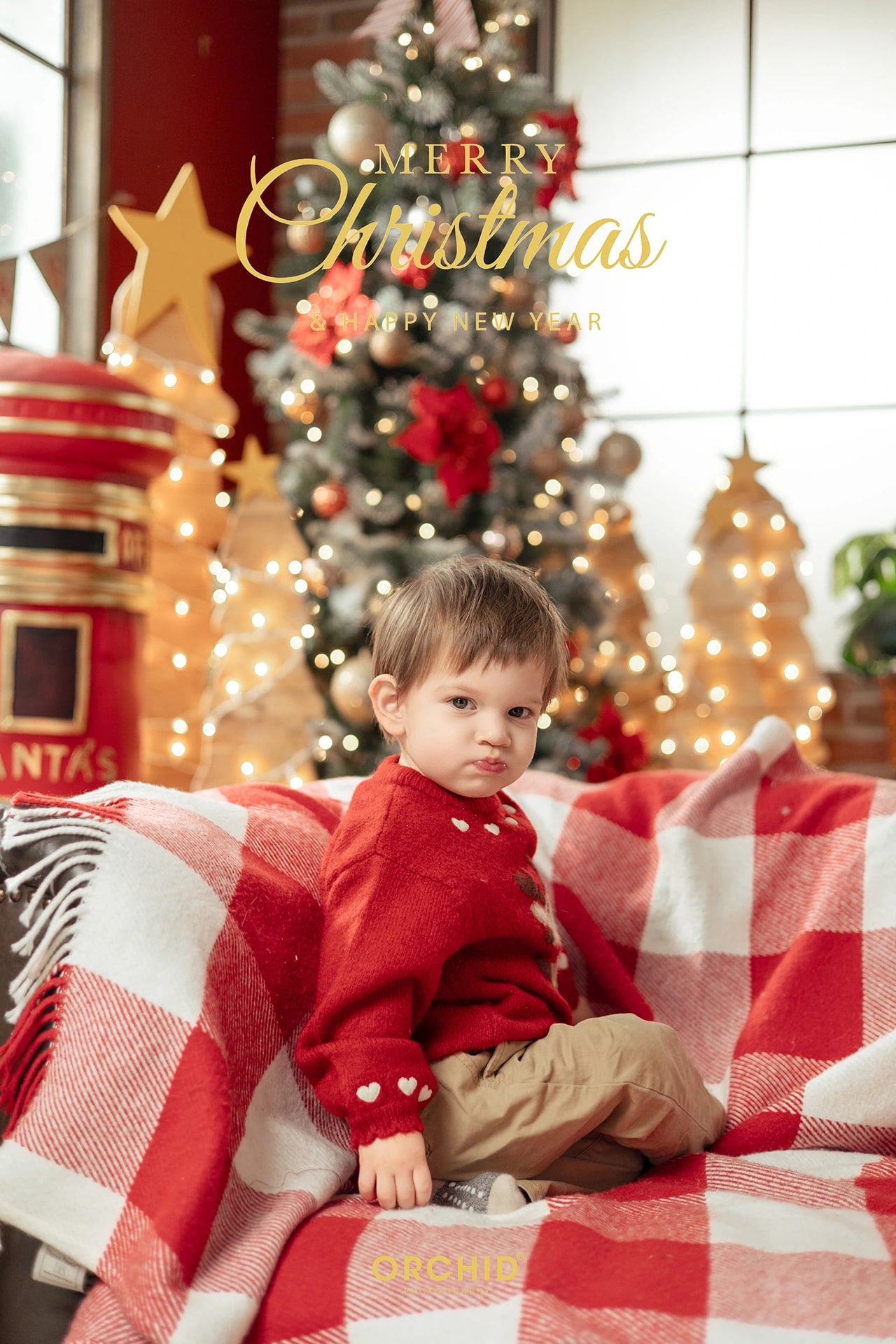 Christmas Wonder — a mother and a toddler in a red sweater
